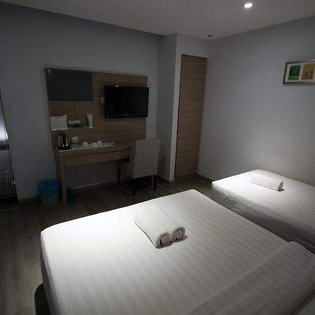 Hotel 99 Pusat Bandar Пухонг Екстериор снимка