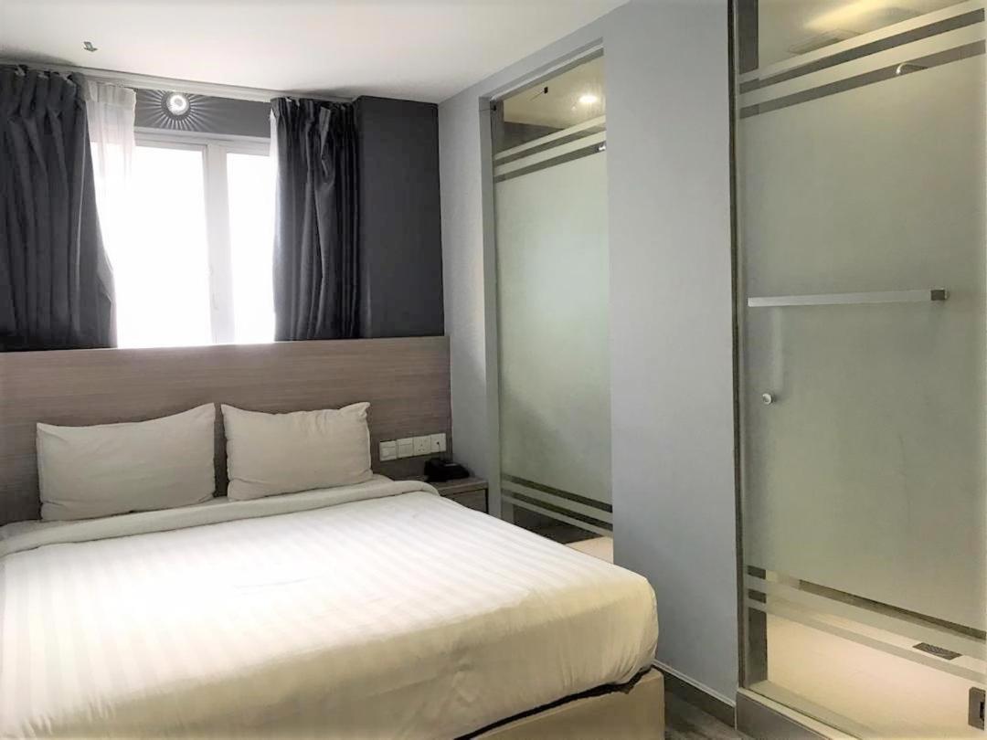 Hotel 99 Pusat Bandar Пухонг Екстериор снимка