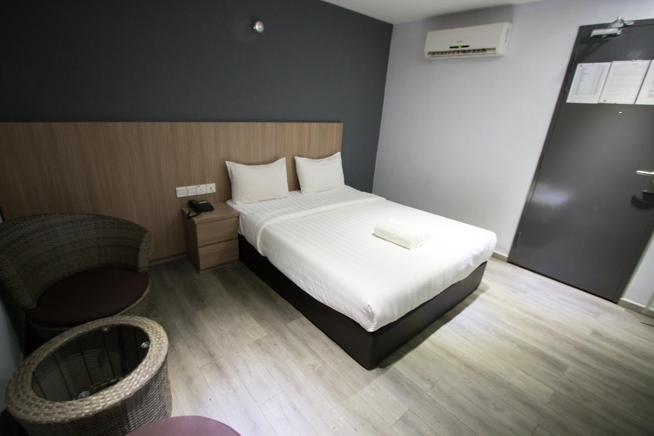 Hotel 99 Pusat Bandar Пухонг Екстериор снимка