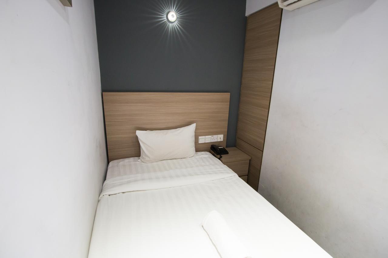 Hotel 99 Pusat Bandar Пухонг Екстериор снимка