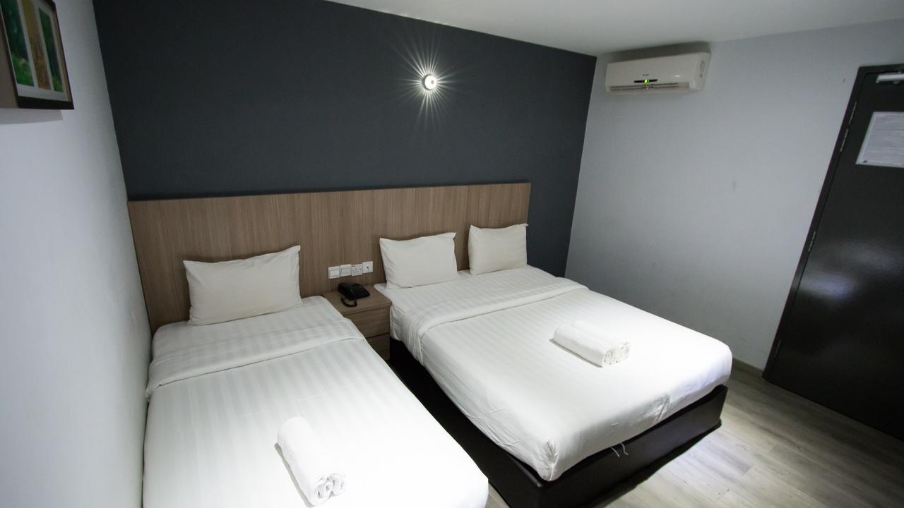 Hotel 99 Pusat Bandar Пухонг Екстериор снимка