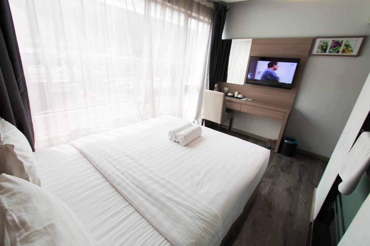 Hotel 99 Pusat Bandar Пухонг Екстериор снимка