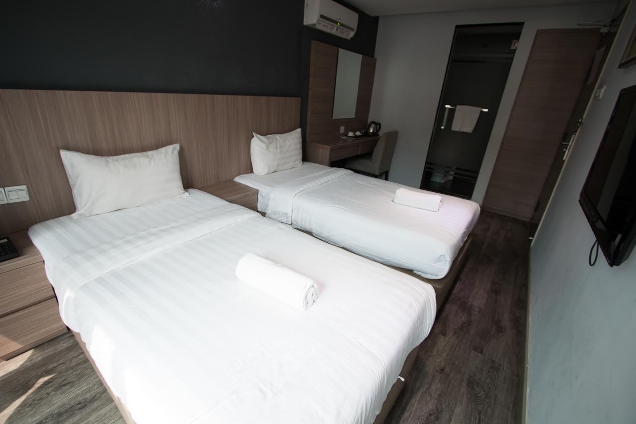 Hotel 99 Pusat Bandar Пухонг Екстериор снимка