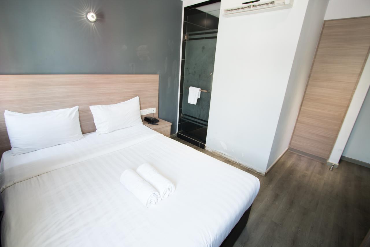 Hotel 99 Pusat Bandar Пухонг Екстериор снимка