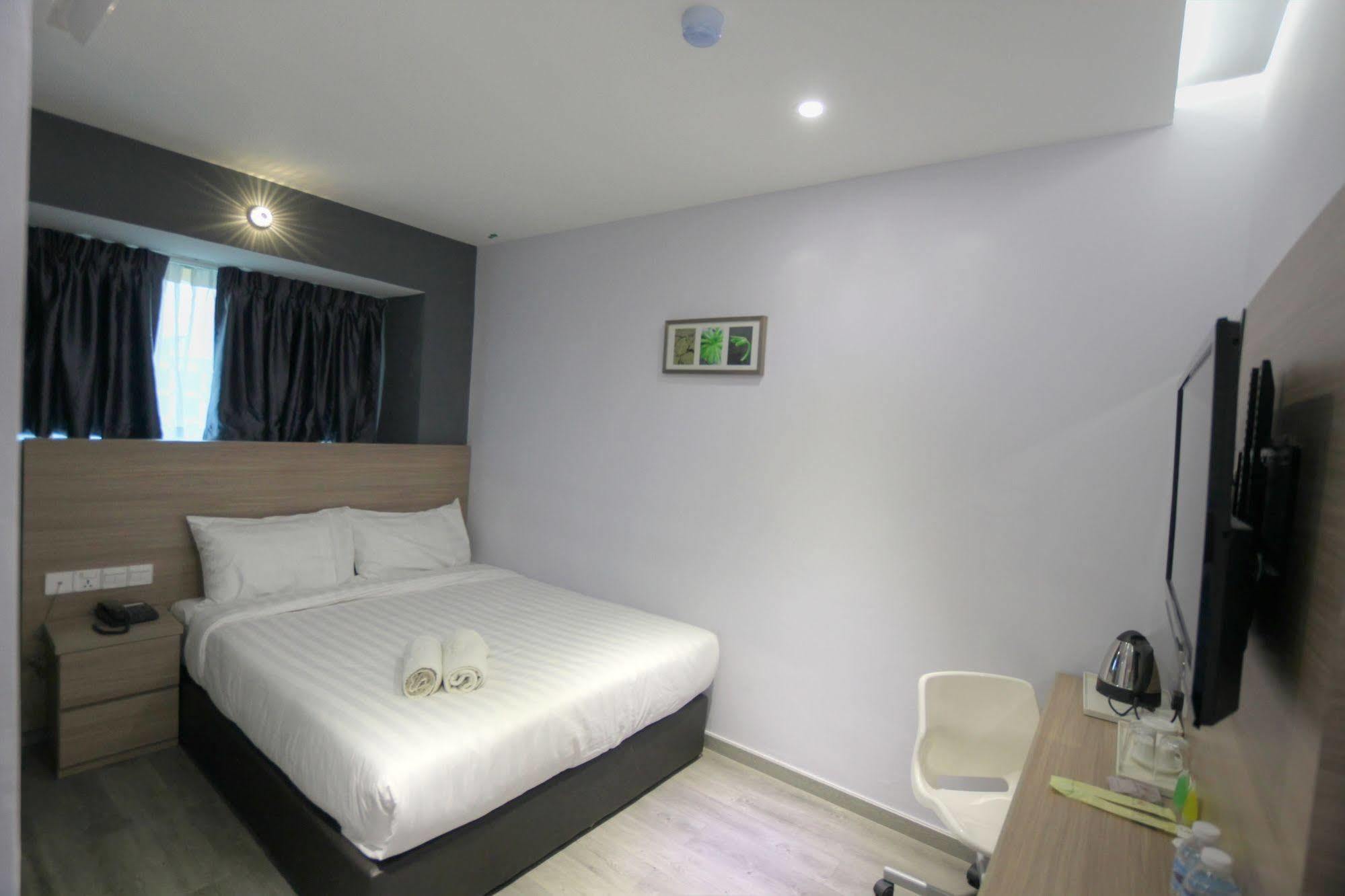 Hotel 99 Pusat Bandar Пухонг Екстериор снимка
