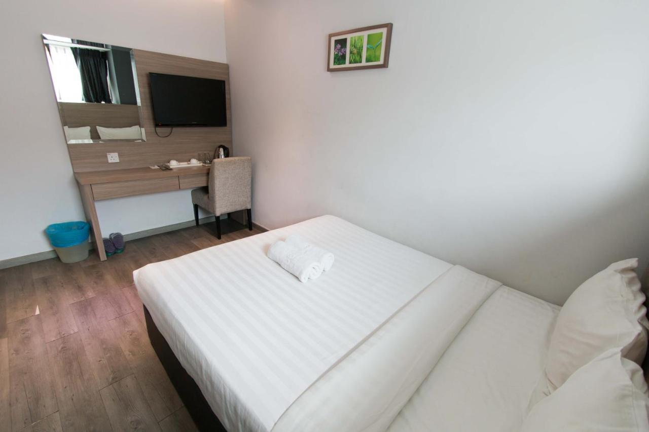 Hotel 99 Pusat Bandar Пухонг Екстериор снимка