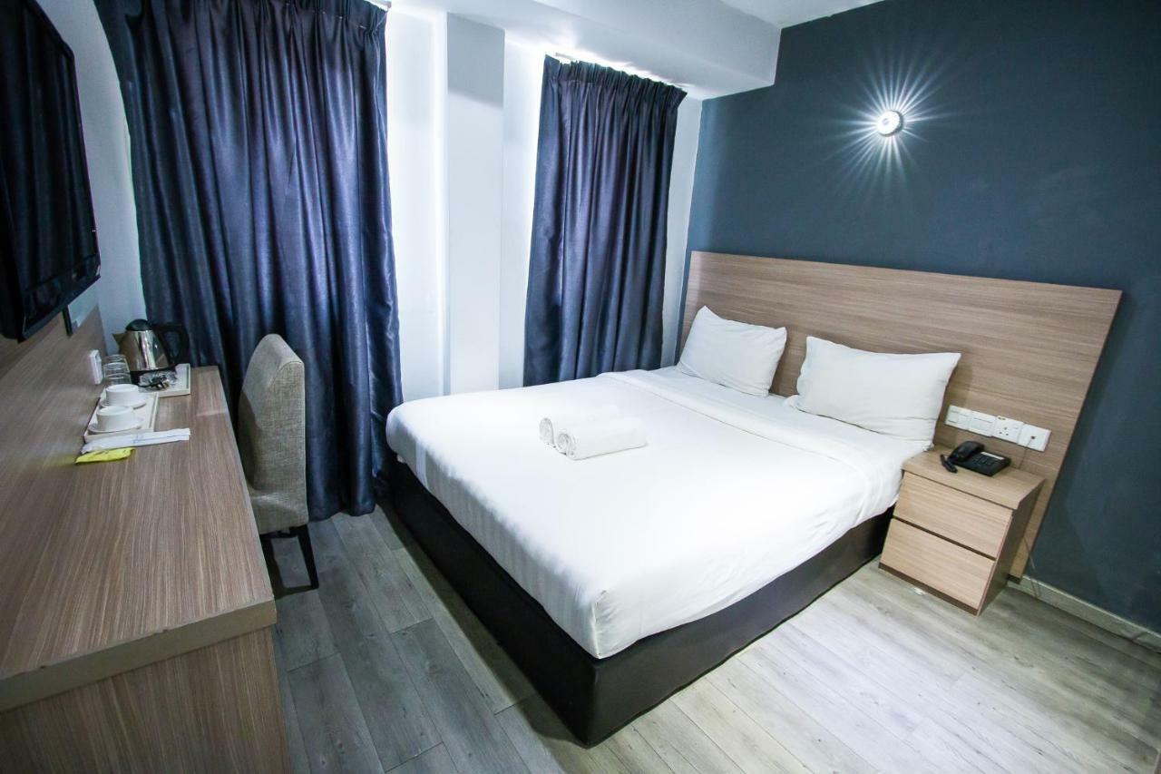 Hotel 99 Pusat Bandar Пухонг Екстериор снимка