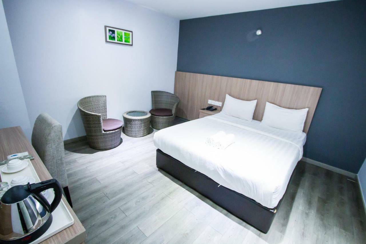 Hotel 99 Pusat Bandar Пухонг Екстериор снимка