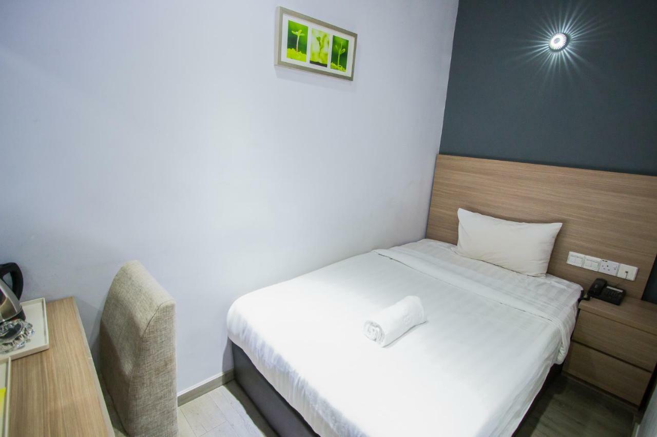 Hotel 99 Pusat Bandar Пухонг Екстериор снимка
