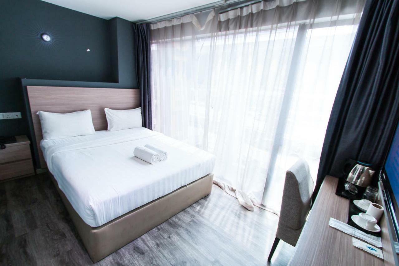 Hotel 99 Pusat Bandar Пухонг Екстериор снимка